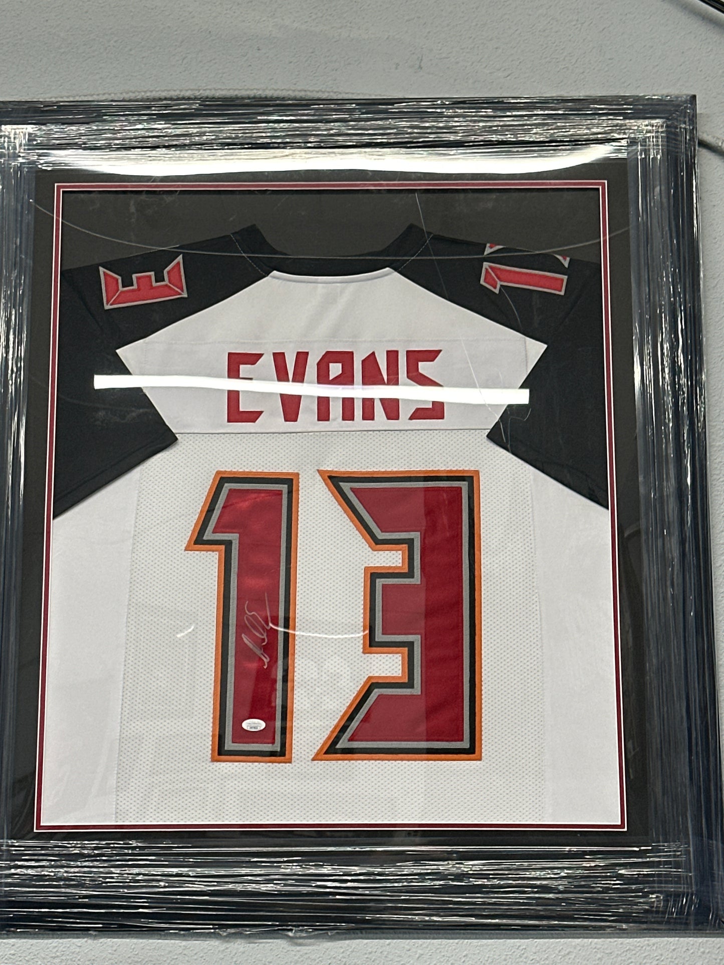 Framed White Mike Evans signed jersey