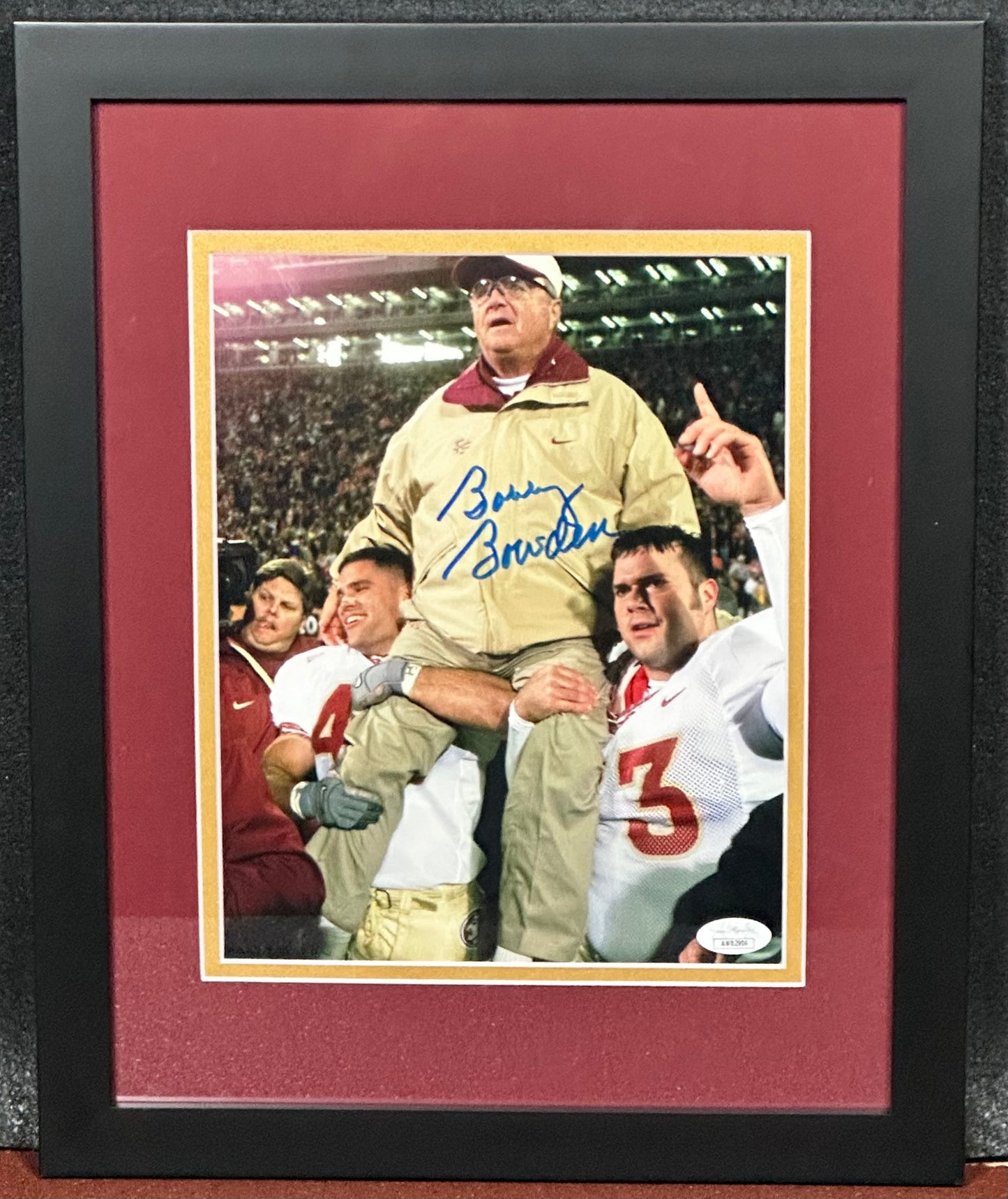 Bobby Bowden Signed Photo Held Up By Two Players